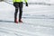 A male skier practicing cross country skiing as a recreational activity