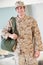 Male Soldier With Kit Bag Home For Leave