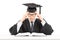 Male student in graduation gown trying to concentrate on studying