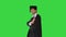 Male student in graduation robe taking different poses with diploma on a Green Screen, Chroma Key.