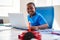 Male Student In After School Computer Coding Class Learning To Program Robot Vehicle