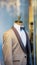 Male suit tuxedo defocused background on mannequin in the living room