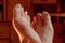 Male toes and toenails after pedicure, close-up. Bare feet of an adult Caucasian male. The concept of body care, rest