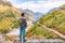 Male tourist get an aerial view of mountain river valley in the Himalayan region of Kausani Uttarakhand India