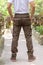 Male tourist in the park. Tourism and travel concept, cargo pants