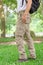 Male tourist in the park. Tourism and travel concept, cargo pants
