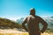 Male tourist standing in mountain scenery