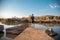 Male training on a jump rope near a river