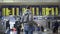 Male traveler looking at flight arrive and departure information in airport