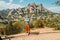 A male traveller enjoys the view from the mountains of Montserrat in Spain