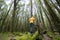 A male traveller exploring the amazing breath taking beech forest