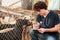 Male vet examining dogs in animal shelter