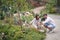 Male visitor and female guide studying the plants