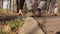 A male volunteer walks around the Park and collects garbage