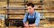 Male waiter using digital tablet at counter