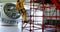 Male worker climbing scaffolding at solar station 4k