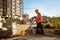 Male worker making concrete at construction site