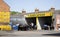 Male worker wash the car with high pressure washer at hand car wash Jet Petrol Station in 20 Manthorpe Rd, Grantham.