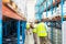 Male workers checking stocks in warehouse