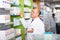 Male working in chemist shop