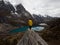 Male yellow jacket hiker Cordillera Huayhuash Circuit andes mountain Mirador Tres Lagunas three lakes view Huanuco Peru