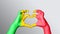 Mali flag color, hands show symbol of heart and love