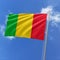 Mali flag fluttering in the wind on sky.