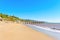 Malibu Beachscape: Wooden Pier, Sandy Shore and Coastal Homes