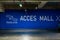 Mall access sign. Underground parking lot sign