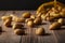 mall irregular shaped ratte potatoes scattered on the surface of a wooden table