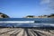 Mallorca in february 2019. The bay of port de soller with lighthouses, beach and waves.