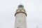 Mallorca, lighthouse next to the Mediterranean Sea, blue sky wit