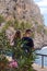 Mallorca, Spain, July 2019. Loving couple admires the scenery. Beautiful famous bay of Sa Calobra on the island of Mallorca, Spain