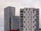 MalmÃ¶, Sweden - November 18, 2018: The facade of Clarion Hotel MalmÃ¶ Live and a residential building on a grey overcast day