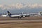 Malpensa Airport, Milan, Italy - 02 06 2019: RYANAIR View over Terminal 1 with mountains Alps in the background