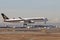 Malpensa Airport, Milan, Italy - 02 06 2019: SINGAPORE AIRLINES View over Terminal 1 with mountains Alps in the background