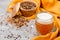 Malt grain and a glass of beer. Mixed varieties of malted grain on a gray background. close-up