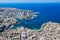 Malta aerial view. St. Julian`s San Giljan and Sliema cities. Towns and coastline of Malta from above. Skyscraper in Paceville.