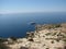 Malta - Boat crossing the island near the blue grotto