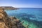 Malta - Ghajn Tuffieha bay view on a nice summer day with crystal clear water