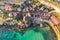 Malta, Il-Mellieha. View of the famous famous village Popeye aerial view and bay on a sunset light