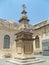 Malta La Valletta courtyard monument with skulls and cross