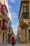 Malta, Typical narrow streets with colorful balconies in Valletta , Malta