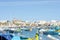 Maltese fishing village of Marsaxlokk with traditional painted boats