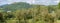 Malvern Hills and distant little, white country cottage,Ledbury,Herefordshire,United Kingdom