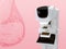Mammography device for screening breast cancer in hospital on pink background.