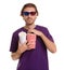 Man with 3D glasses, beverage and popcorn during cinema show