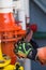 Man or able seaman is opening valve of a big pipe. Liquid Cargo