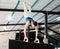 Man, acrobat and gymnastics upside down in balance for fitness practice, training or workout at gym. Professional male