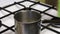 A man adds agar agar, sugar and water for cooking syrup to the stewpan. For the preparation of a marshmallow